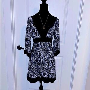 Faux Wrap Black and White Floral Dress w/ wide flair kimono style sleeves.